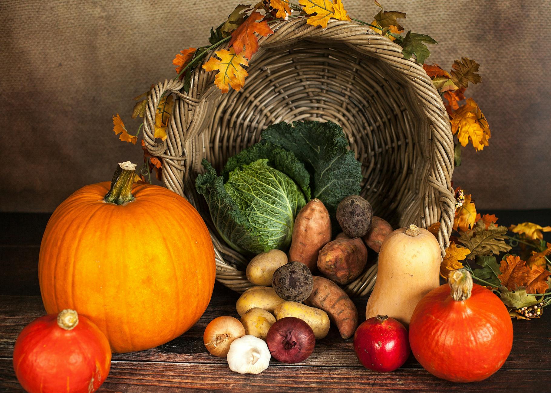 vegetable and crops beside spilled basket